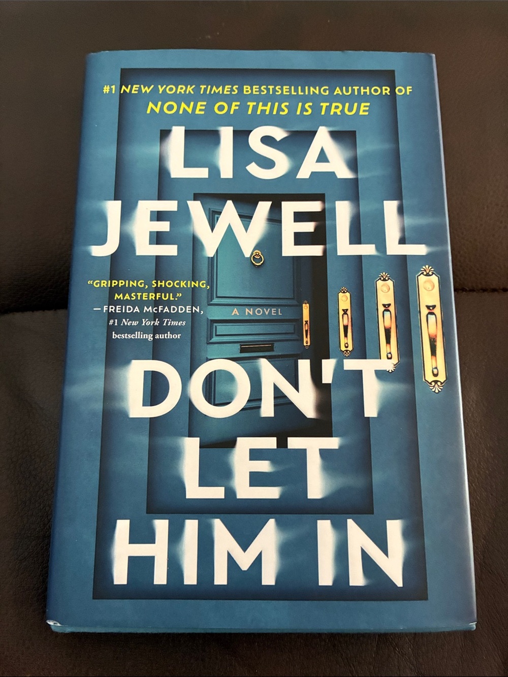 Lisa Jewell "Don't Let Him In" Hardcover Book - Blue Cover